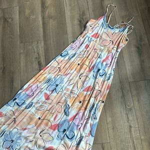 NWOT Ripcurl dress, floral print with backless detail size medium